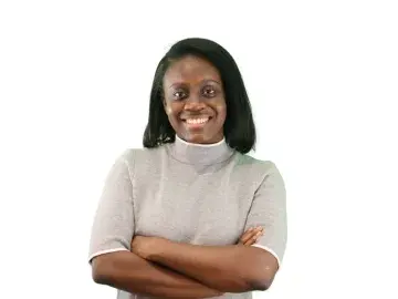 Sephora Saint-Armand with arms crossed on a white background
