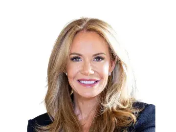 Patrice King Brickman in a dark blazer against a white background.